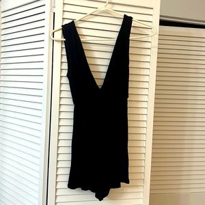 Urban Outfitters black romper with low V neck and back